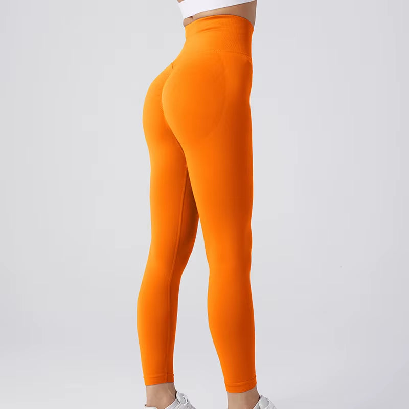 High-Waisted Nylon Gym Leggings for Women - Breathable, Thick, and Non-Transparent Sports Pants Available in 19 Colors