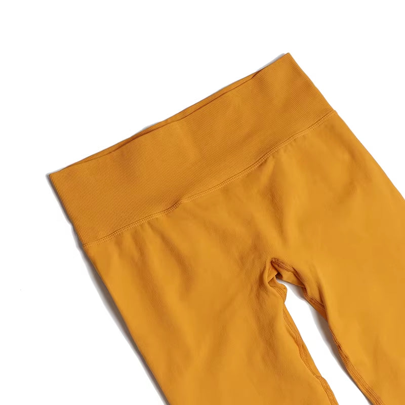 High-Waisted Nylon Gym Leggings for Women - Breathable, Thick, and Non-Transparent Sports Pants Available in 19 Colors