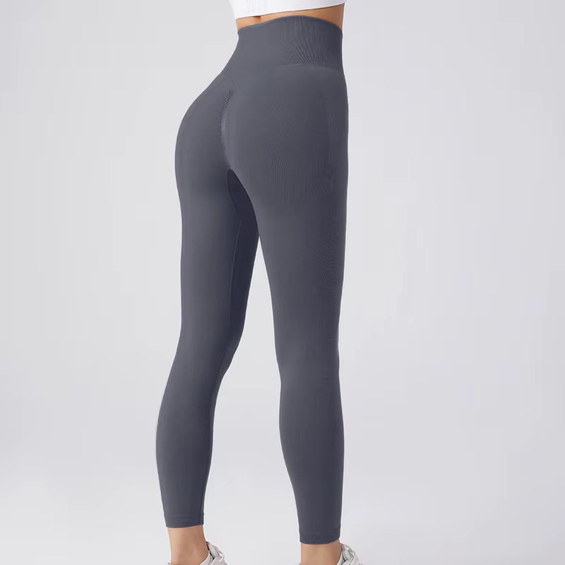 High-Waisted Nylon Gym Leggings for Women - Breathable, Thick, and Non-Transparent Sports Pants Available in 19 Colors